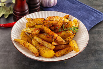 Baked crispy hot potato with rosemary