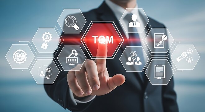 Businessman touching a screen with icons representing total quality management concepts and strategy