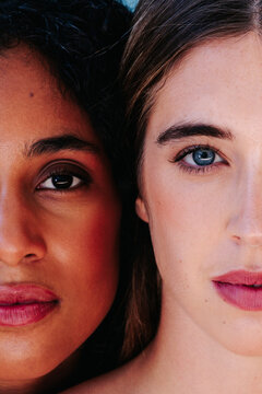 Close up of two faces showing diversity and natural beauty