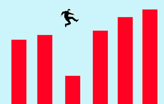 Businessperson jumping over bar graph symbolizing growth and initiative