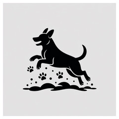 Silhouette of a happy dog jumping with paw prints