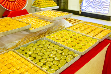 Karisik Turk tatlilari. New dessert varieties at the  luxury hotel open buffet. Milk-based desserts,  Turkish Dessert Sobiyet, havuc dilimi, midye baklava, mussels baklava and classic baklava. 