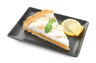Slice of tasty lemon meringue tart with mint isolated on white