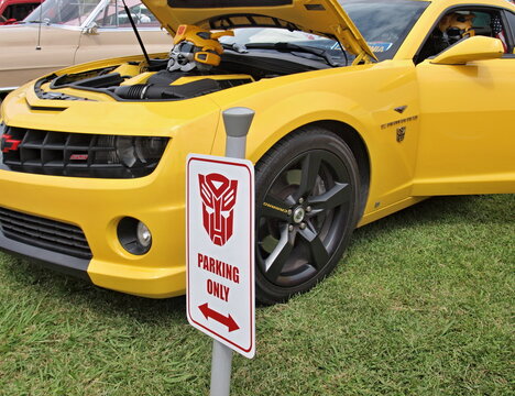 Yellow Chevrolet Camaro Transformers Bumblebee replica at car show