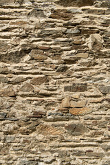 Stone walls of historical buildings. Stone walls of old wooden buildings. Stone-built architecture. Stone walls of historical Birgi houses in the &Ouml;demiş district. T&uuml;rkiye.