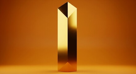 A tall, golden obelisk with a pointed top standing against a warm orange background.