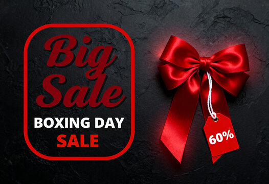 Boxing day sale promotion poster with big sale text and red ribbon with 60% discount tag on dark textured background