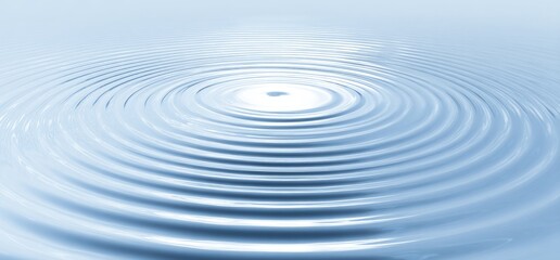 Ripples expanding across a calm water surface