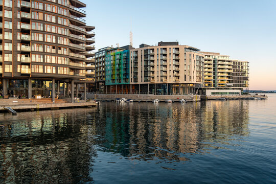 Modern upscale waterfront architecture in Oslo Tjuvholmen at sunset