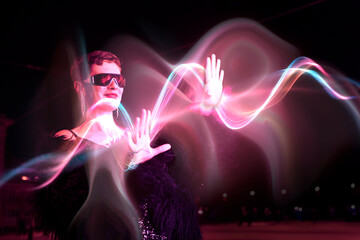 Engineer interacting with virtual data visualization in a server room