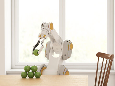 Robot arm arranging green apples on table in modern kitchen