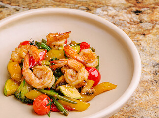 Shrimp stir-fry with fresh vegetables served in a bowl