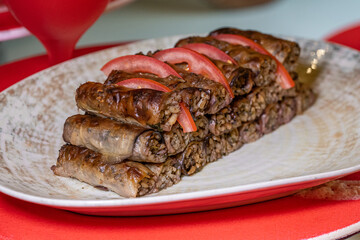 Platter of antipasti and appetizers. Mix of dried meat Jerky . From chicken , beef and pork. wine snacks. Luxury hotel open buffet with a wide variety of meats. Lamb kebab