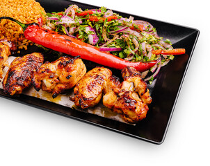 Delicious grilled chicken with spicy pepper, rice, and fresh salad