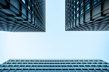Structured modern architecture facade showing strong symmetry, minimalism, geometry and reflection unified through purposeful urban design and consistent architectural detail