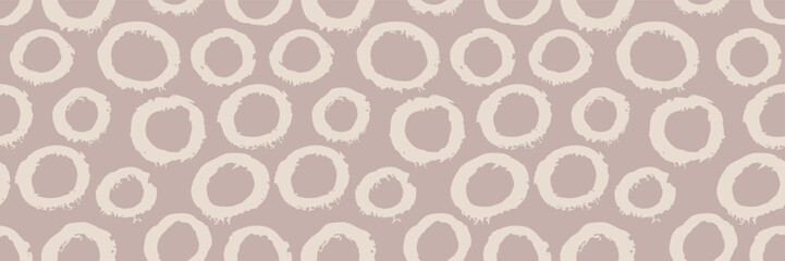 Seamless beige spot pattern with neutral leopard print and cute background.