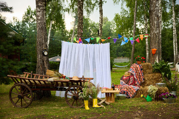 Rustic Decor with Flowers in Rubber Boots	