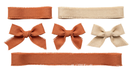 Isolated assortment of craft burlap bows and ribbons in natural and orange shades close-up