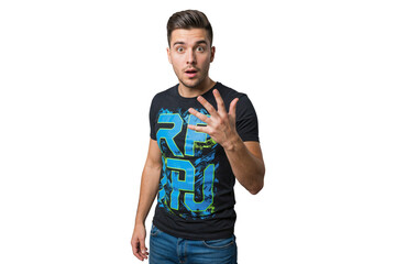 Shocked young man reacting with surprised expression in casual t shirt