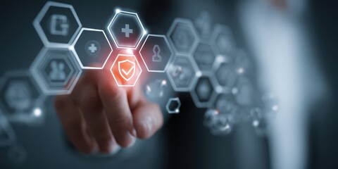 Businessman touching digital interface with medical and insurance icons for healthcare concept