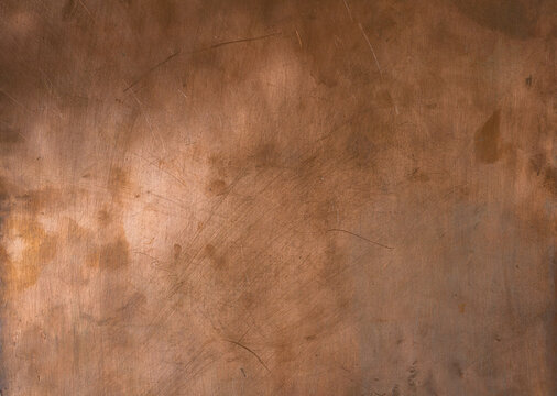 Aged Scratched Copper Metal Texture with Wear Marks and Natural Imperfections. Tactile Content. Natural Lighting. Copper Textures as a Background for a Website, Buttons, Banners, or Content Blocks.
