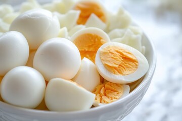 A bowl filled with boiled eggs, diced potatoes, and a slice of ham. The bowl is placed on a white tablecloth, and the scene takes place in a kitchen setting with a window in the background.