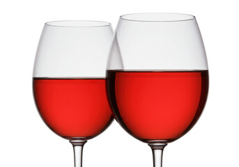 Isolated pair of glasses filled with red wine, ready for celebration or tasting event
