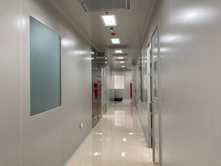 Clean and modern corridor in a laboratory, reflecting a sterile environment for science and technology