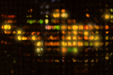 Close up blurred and softy bokeh of multicolor from LED lighting on stage. Background for dramatic or mystery or Sci-fi concept.