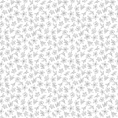 Seamless pattern of sketched flowers and leaves scattered on a white background in a simple style design