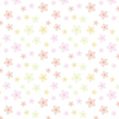 A seamless pattern of pastel colored flowers scattered on a white background in a random arrangement