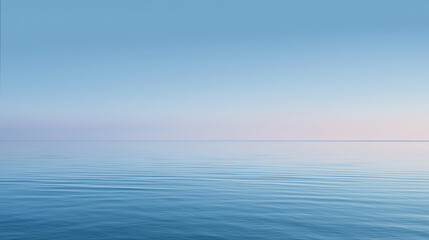 Fototapeta premium A tranquil minimalist ocean line under soft pale-blue sky.
