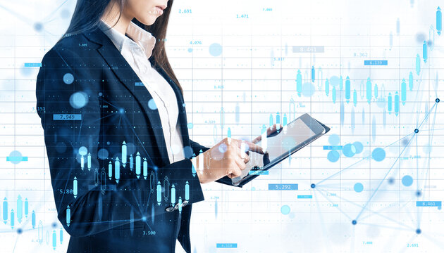 Businesswoman using digital tablet with abstract financial graph and stock chart overlay, on white background, concept of market analysis