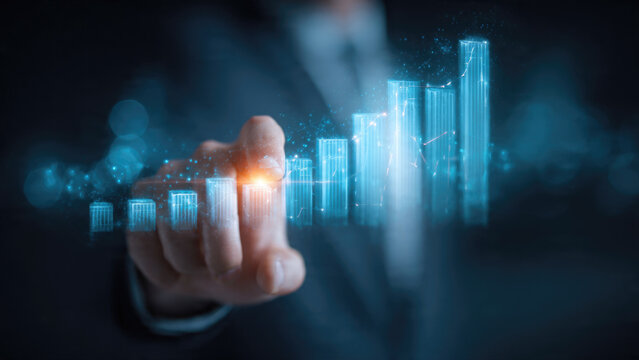 A hand interacts with a glowing, rising holographic bar graph, visualizing digital business growth, data analysis, and technological advancement, representing progress and success.