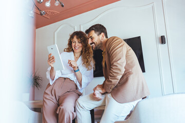 Friends At Home Collaborating On Tablet, Casual Business Vibe, Happy Teamwork Moment