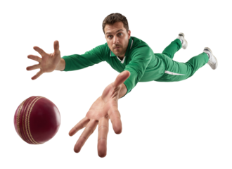 Cricket fielder in green uniform diving forward to stop the cricket ball