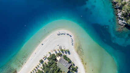 Aerial summer travel scene showing &Ouml;l&uuml;deniz Blue Lagoon&rsquo;s vivid turquoise sea