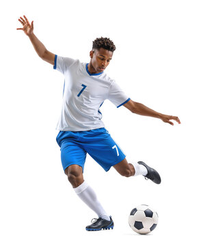 Male athlete wearing blue ready kicking a ball in a powerful strike for a goal