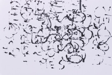 Handwritten text on white paper featuring abstract symbols and patterns. The randomness emphasizes creativity and artistic freedom, suitable for diverse projects.