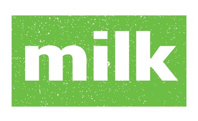 milk text written on green stamp sign.