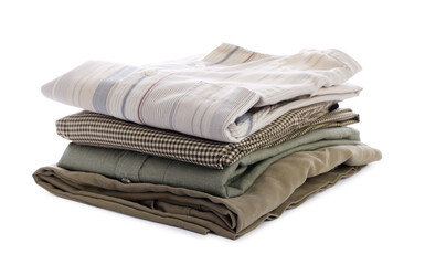 Stack of clean clothes isolated on white