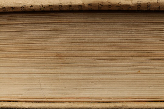 Old book close-up. Texture. Background. Copy space.