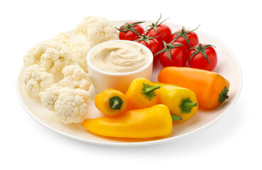 Different fresh vegetables and sauce isolated on white