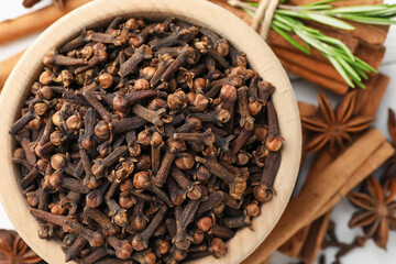 Different spices and fresh rosemary for mulled wine on table, flat lay