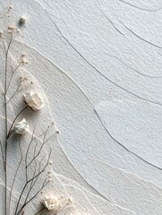 A close-up of delicate dried white flowers and thin branches against a textured, pale background with flowing lines.
