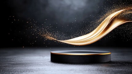 A dark, textured surface with a black, circular podium featuring a gold trim, above which a golden ribbon flows and gold dust particles scatter.