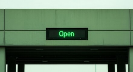 Open Sign Illuminated Against Building Facade Signaling Availability and Public Access