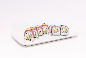  Squid Uramaki with fresh squid, cucumber, and a red masago roe exterior