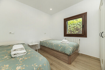 Composition showcasing the functionality of a fold-down bed with its memory foam comforter and removable graphite gray cover