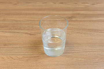 The geometric filigree on a clear glass transforms direct light into a spectacle of tiny sparkles that illuminate its outline.